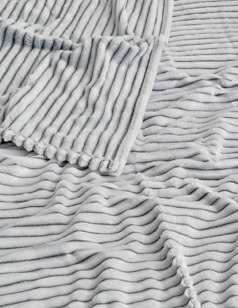 Plaid polaire côtelé extra doux et...