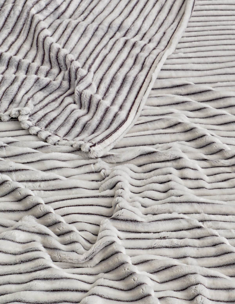 Plaid polaire côtelé extra doux et...